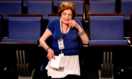 Long-time White House correspondent Helen Thomas taking up her seat