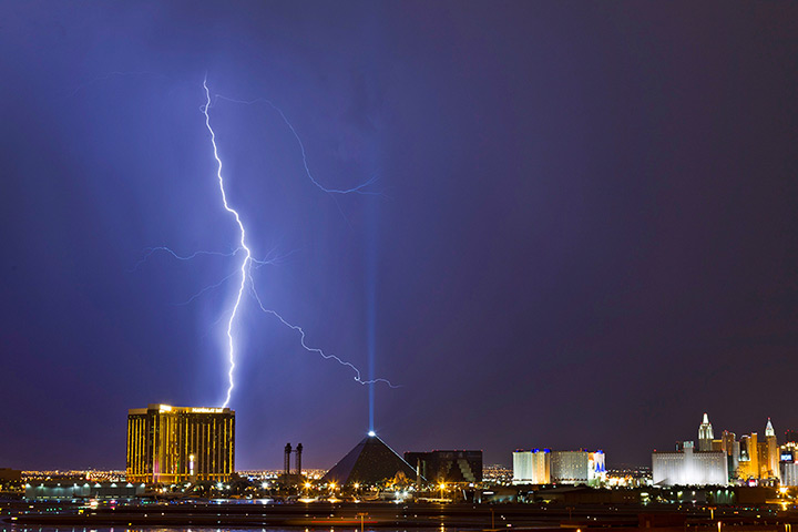 Weekend in pictures: Las Vegas,  US: Lightning strikes above the Mandalay Bay and Luxor casinos 