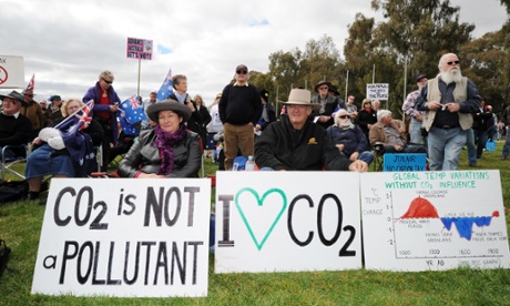 Anti-carbon tax protesters known as The Convoy of No Confidence listen to speeches in front of Parliament House in Canberra.
