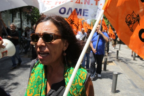 A protesting high-school teacher chants slogans in central Athens, Monday, July 22, 2013.