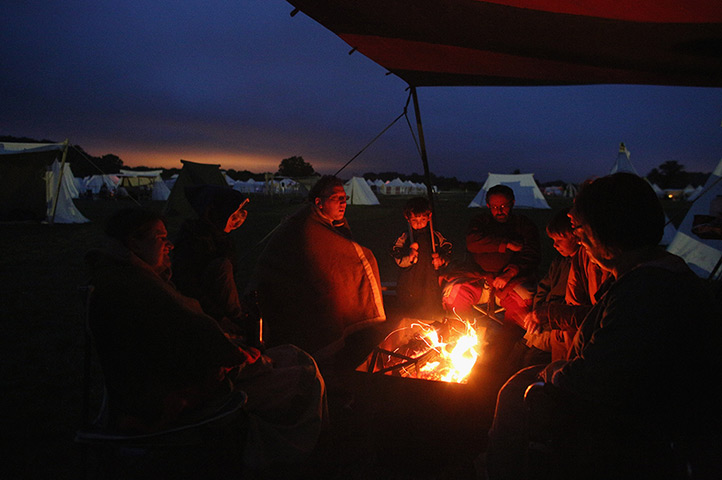 History Live re-enactment: Re-enactors relax by their fires at the end of the first day 