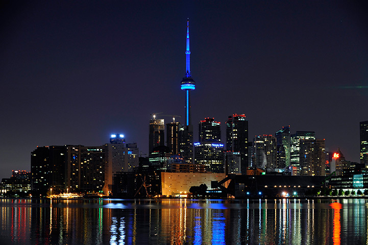 Royal blue: The CN Tower is illuminated in blue light, in Toronto, Canada