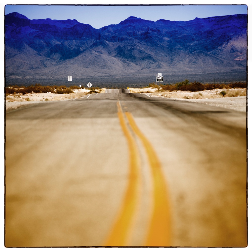 Lonesome road ... out of nevada and into the scrubland and mountains of Utah.