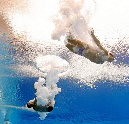 Divers underwater: Michael Hixon and Troy Dumais of the United States