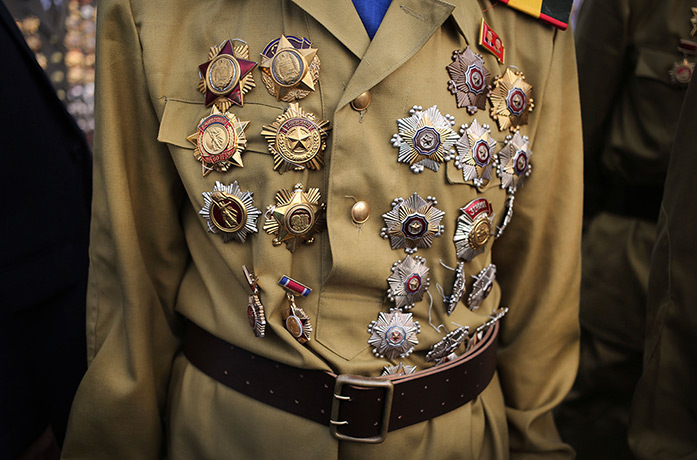 North Korea 60th: Veteran North Korean soldiers arrive in full military dress