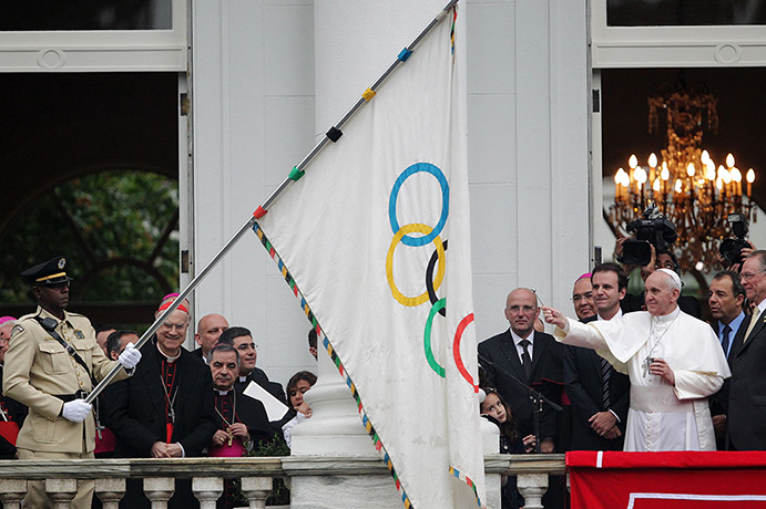 Pope in Brazil: Pope Francis blesses the Olympic flag next to the head of Brazil's Olympic 