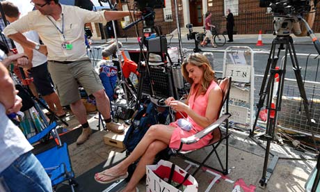 News presenter Natalie Morales of NBC Today knits baby booties in opposite St Mary's Hospital