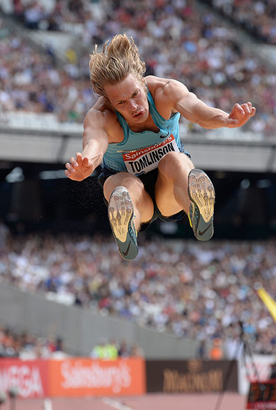 anniversary games: Chris Tomlinson competing in the long jump 