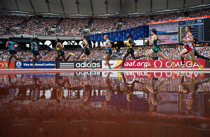 anniversary games: Runners in the Emsley Carr Mile round the final bend