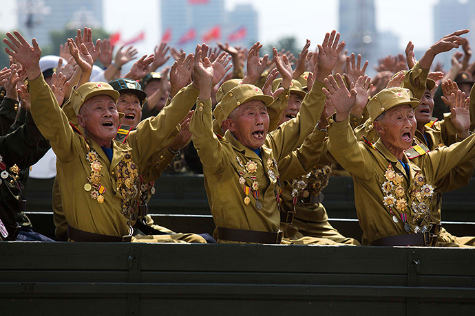 Weekend in pictures: Pyongyang, North Korea: Veterans of the Korean War wave to their leader Kim