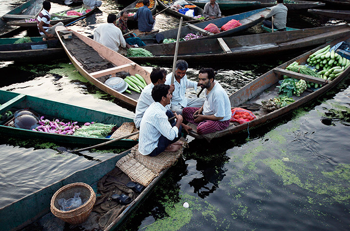 Weekend in pictures: Srinagar, India: Kashmiri men take a break to chat while selling their prod