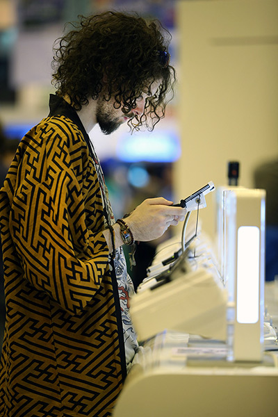 Hyper Japan London: A man tries a Nintendo DS game at the Hyper Japan event 