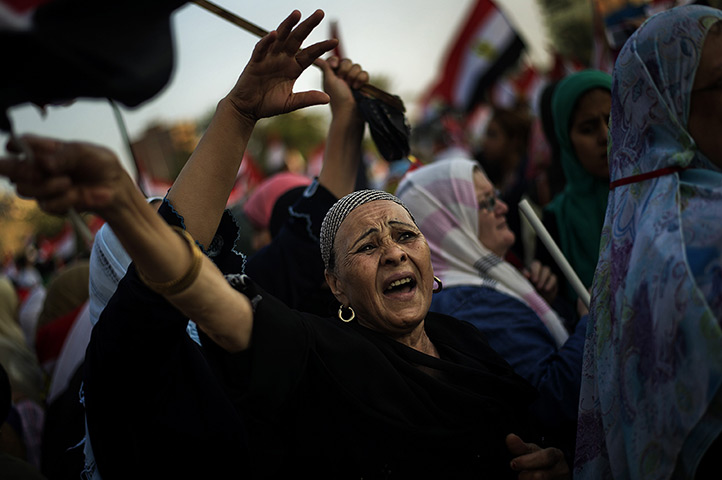 Protests in Egypt: Opposition protesters shout slogans as tens of thousands gather outside the