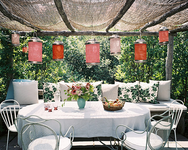 homes - stylists feature: table with lanterns on a sunny day