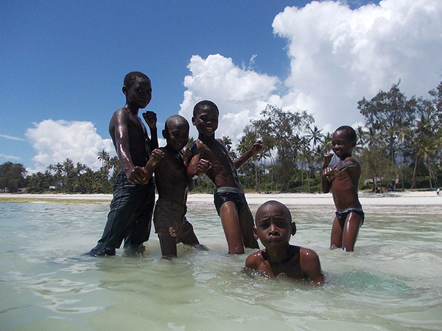 Your Pictures - Tropical: Boys posing in the sea in tropical setting