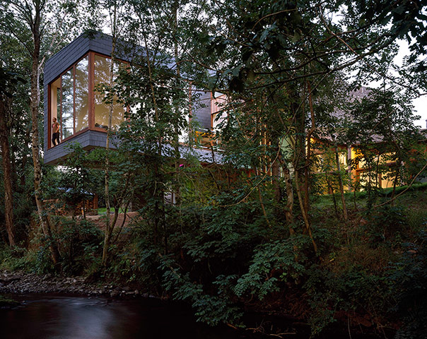 Homes - Welsh House: house overlooking river with trees