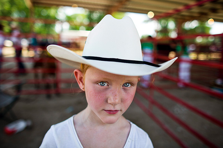 Iowa fair: Seven-year-old Kaylin Helms before leading her cow into the kiddie dairy co