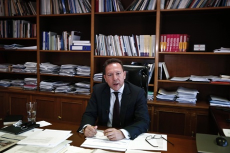Greece's Finance Minister Yannis Stournaras speaks during an interview with Reuters in Athens July 29, 2013.