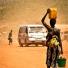 connect4climate: woman carrying water