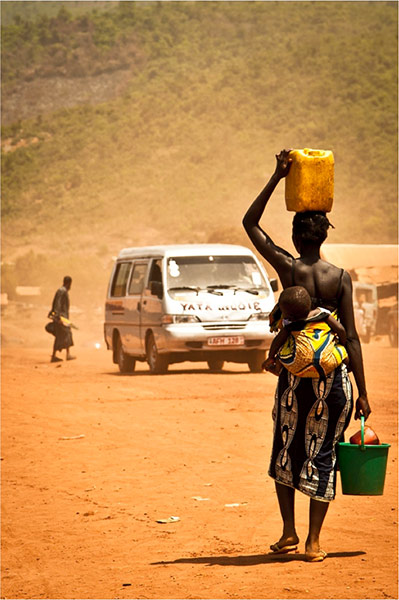 connect4climate: woman carrying water