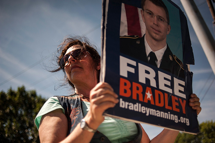 Bradley Manning protests: A protester outside the main gate before the reading of the verdict in Mann