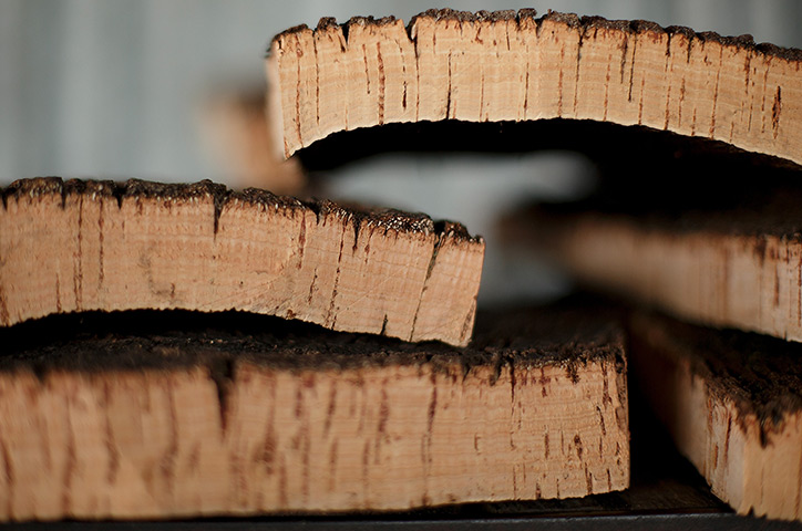 Cork Harvest: Cork planks are stacked at a factory in El Pedroso