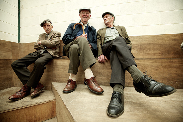 Livestock auction: Retired farmers watch the livestock sale