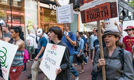 Protesters on Market Street in San Francisco. Photograph: Justin Benttinen