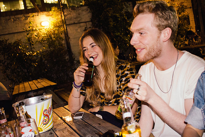 Canonlowlight: Two people enjoying glasses of wine