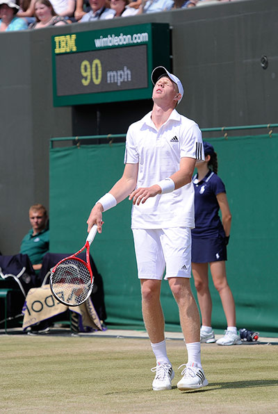 Wimbledon day 11: Kyle Edmund dejected