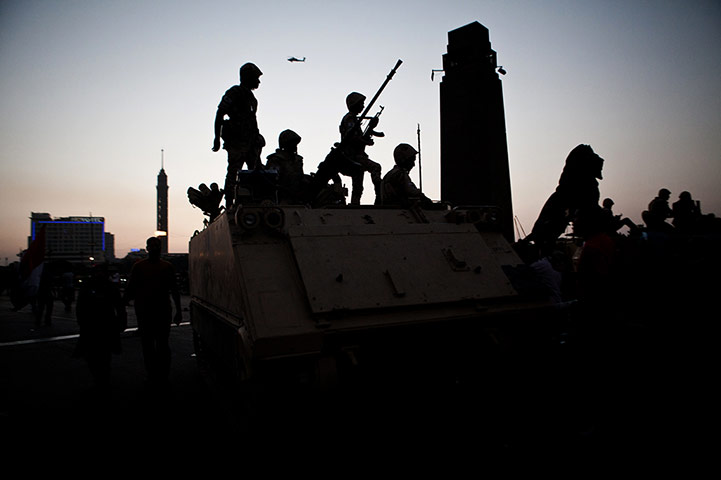 Egypt day update: Egyptian military convoy arrives near Tahrir Square 