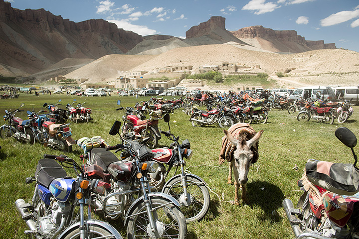 Silk Road Festival: A donkey among the motorbikes parked next to the Band-e Amir (lake) 