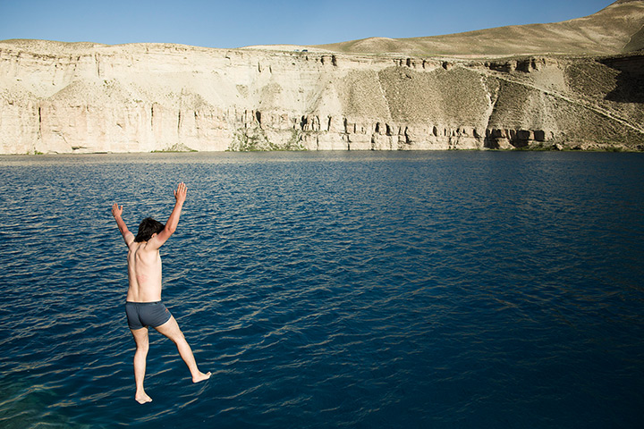 Silk Road Festival: A man jumps into the Band-e Amir (lake) 