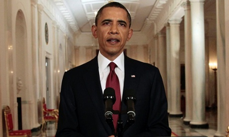 President Barack Obama reads his statement to photographers after making a televised statement on the death of Osama Bin Laden.
