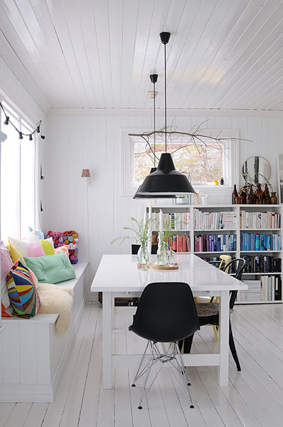 homes - norway house: white room with black shades and black chairs