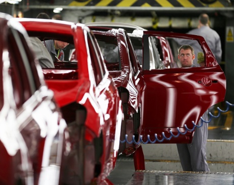 A technician assembles a Nissan car on the production line at Nissan's Sunderland plant on January 24, 2013 in Sunderland, England. The Japanese manufacturer's factory employs 6,225 people producing the Juke, Note and Qashqai models.