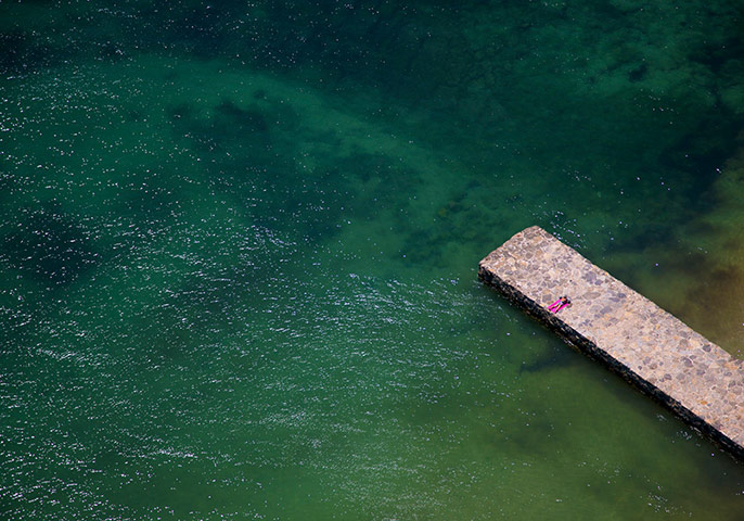 big picture - beach: overhead shot of pier with sea