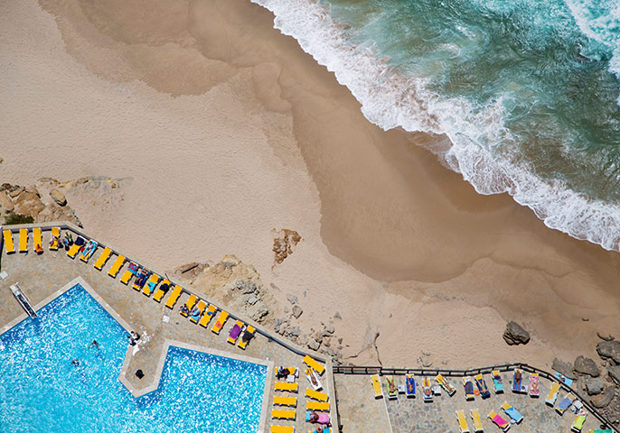 big picture - beach: overhead shot of Lisbon beach sea and swimming pool