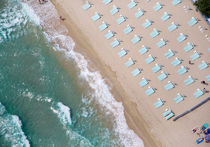 big picture - beach: overhead beach pic with sea and deckchairs