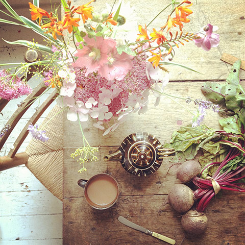 your pictures - produce: beets and flowers on a wooden table with chair