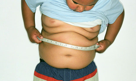 Boy measuring belly