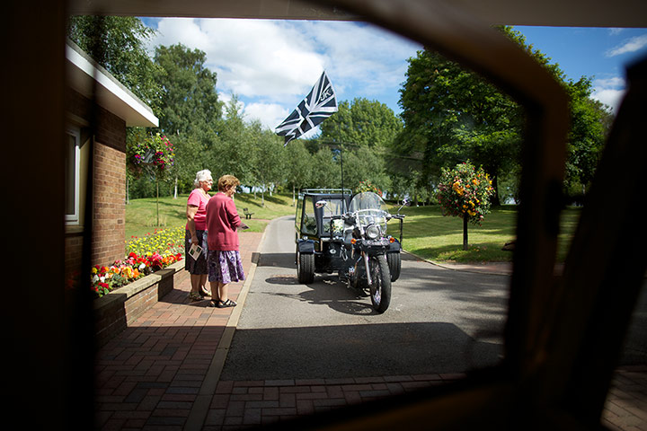 Cremation open day: Visitors admire the Suzuki 1400cc trike and matching diamond black hearse