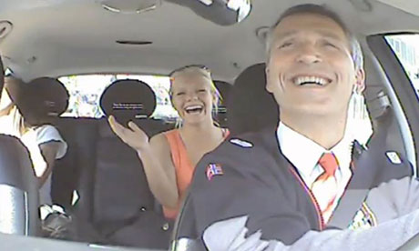 The Norwegian prime minster Jens Stoltenberg turns taxi driver to talk to 

passengers in Oslo.  