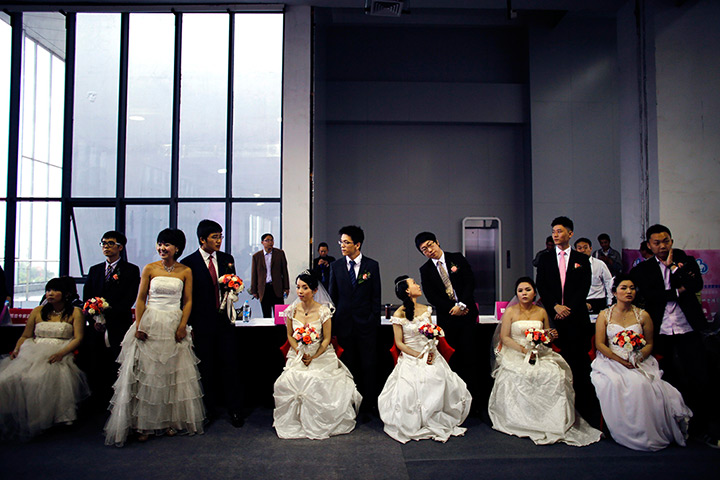 China Valentine's day: Couples wait to participate in a staged mass wedding, organised as part of 