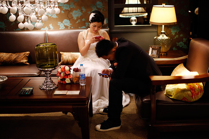 China Valentine's day: A couple waits to participate in a staged mass wedding, organised as part o