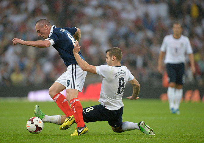England v Scotland 2: Jack Wilshere dispossesses Scott Brown