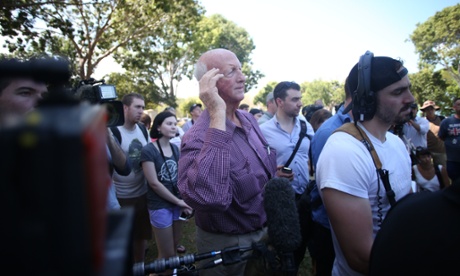 Robert Buchanan a visitor to Darwin from St George in Queensland asked the Prime Minister a question about how long it would take to pay off the debt he has run up at a press conference at the Cenotaph Thursday 15th August 2013.