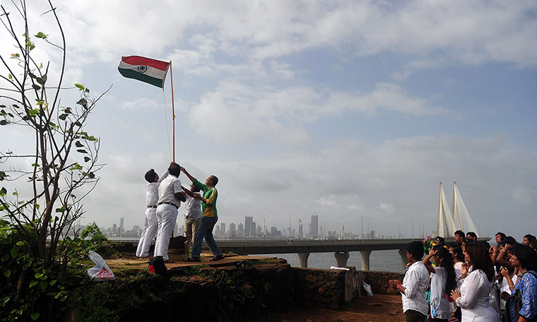 India Independence Day : Indians raise their national flag as the