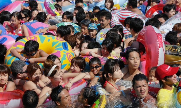 Slow lane: There's no room for swimming at Toshimaen amusement park swimming pool in Tokyo, Japan.