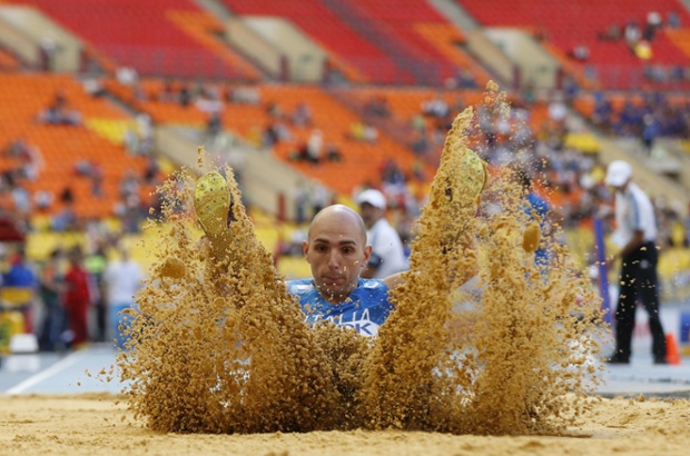 Italy's Fabrizio Schembri competes during the men's triple jump qualifications at the 2013 IAAF World Championships at the Luzhniki stadium in Moscow, Russia. Photograph: Franck Fife/AFP/Getty Images